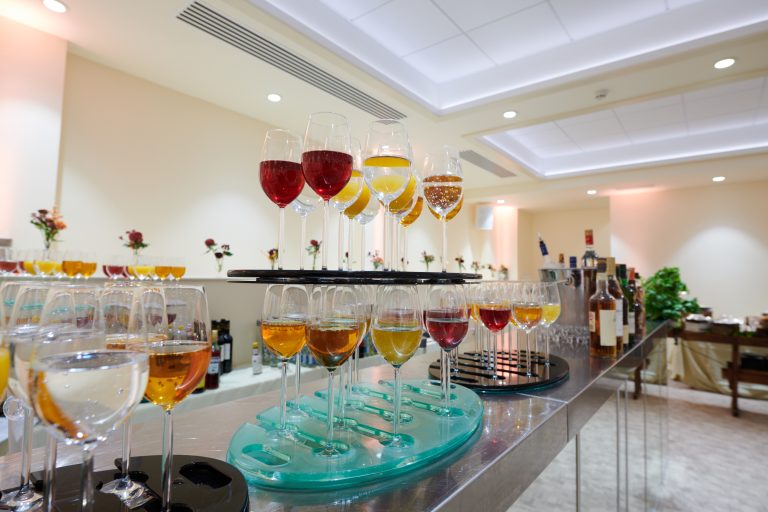 Stacks of drinks on a table.